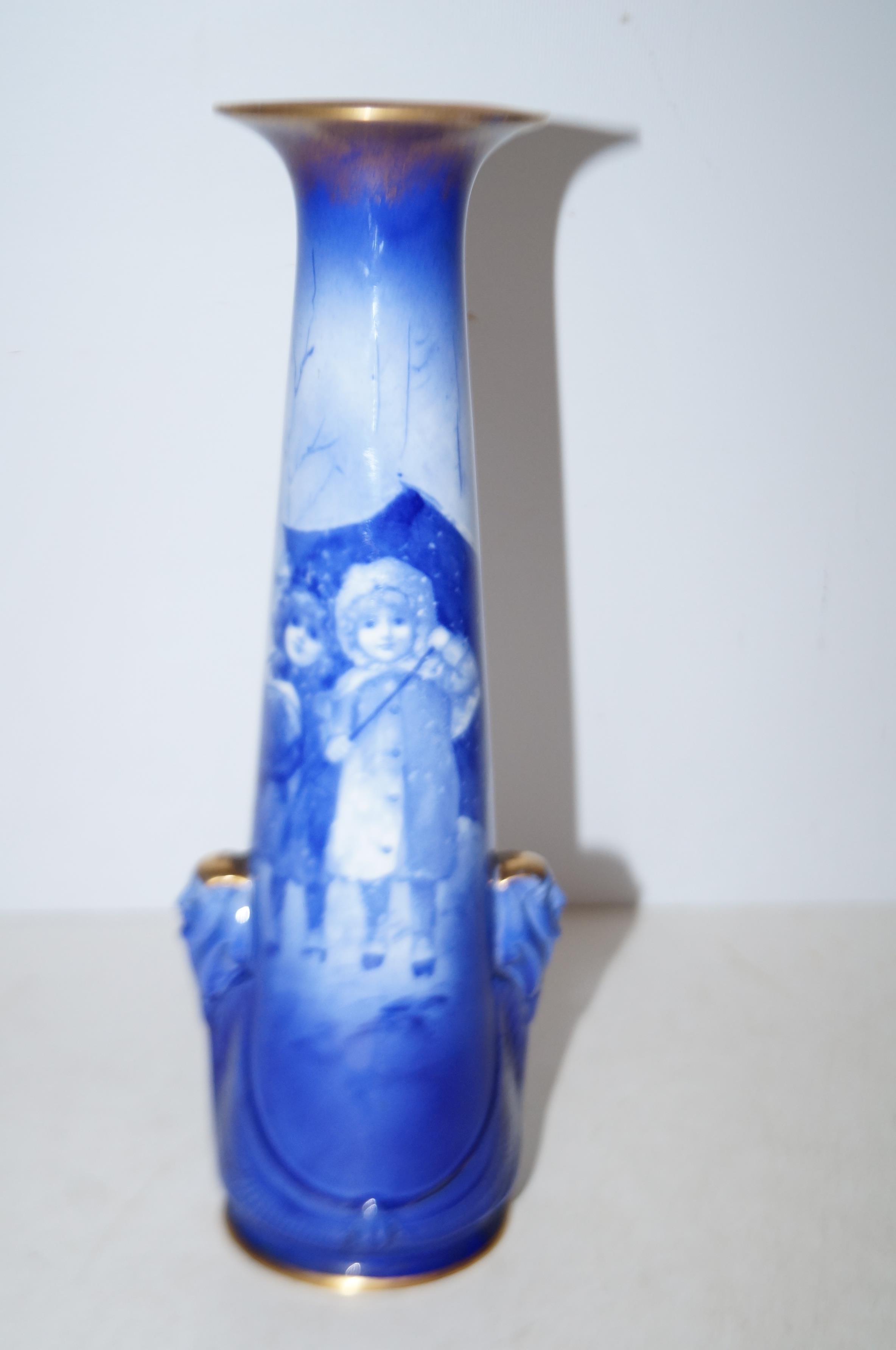 Royal Doulton blue children vase slight crack in b