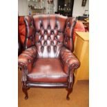 Leather deep buttoned winged backed chesterfield a