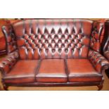 3 seater leather deep buttoned winged backed chest