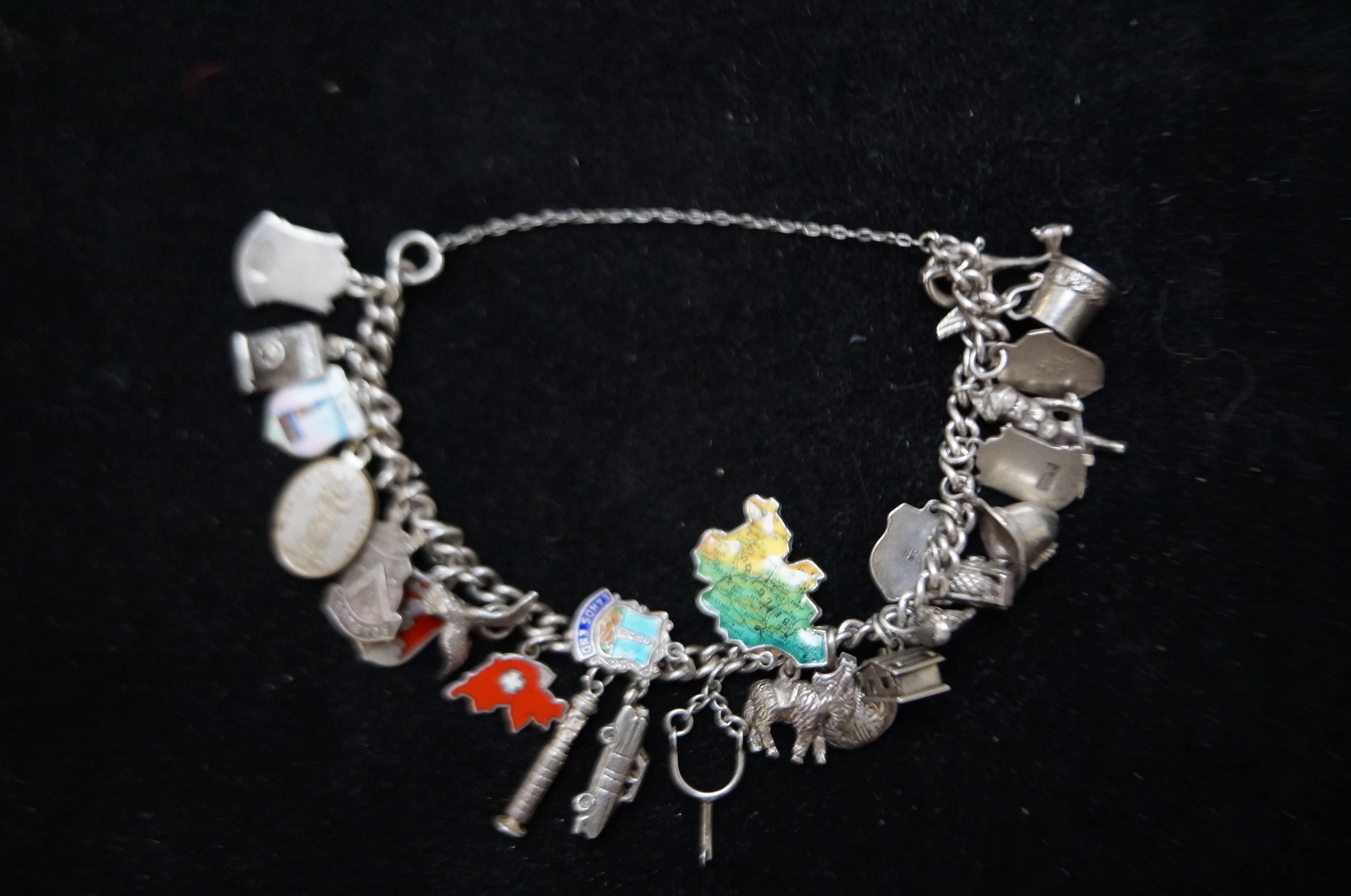 Silver Charm Bracelet with 25 Silver Charms (Weigh