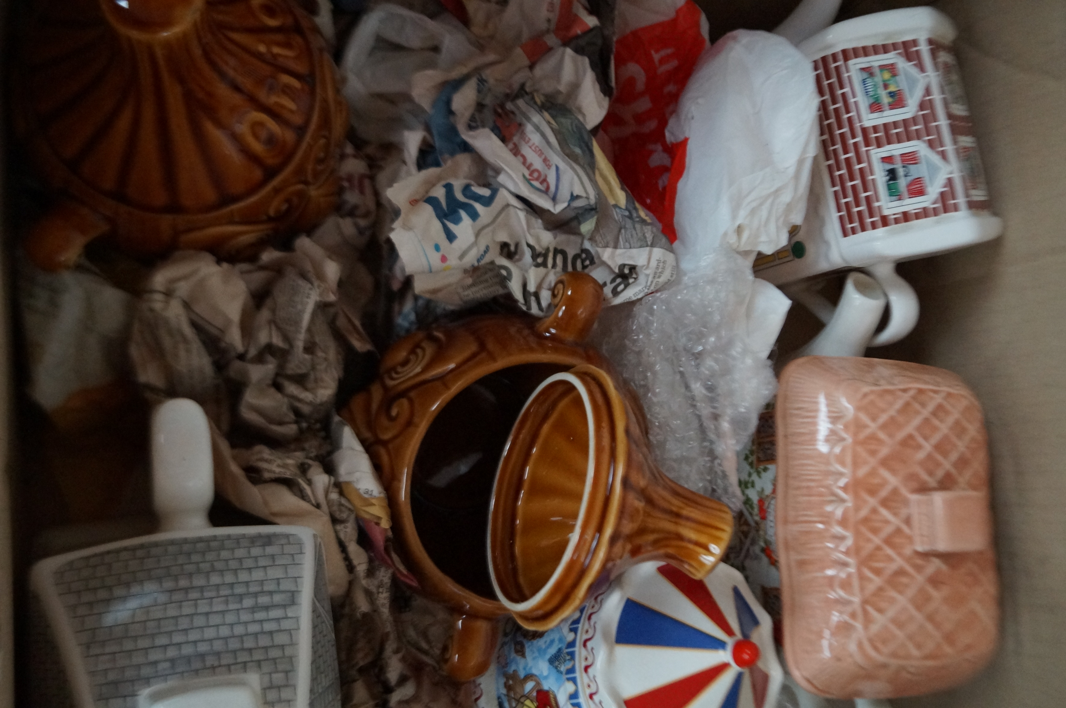 Box of novelty teapots