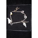 Silver charm bracelet with 6 charms