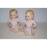 Pair of bisque piano baby's Height 18 cm