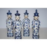 4 ceramic blue & white oriental figures Height 30