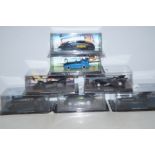 Collection of cased batman cars (7 in total)