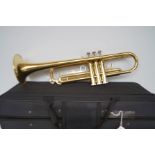 Cased brass trumpet