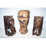 Carved ethnic bust Height 30 cm together with a pa