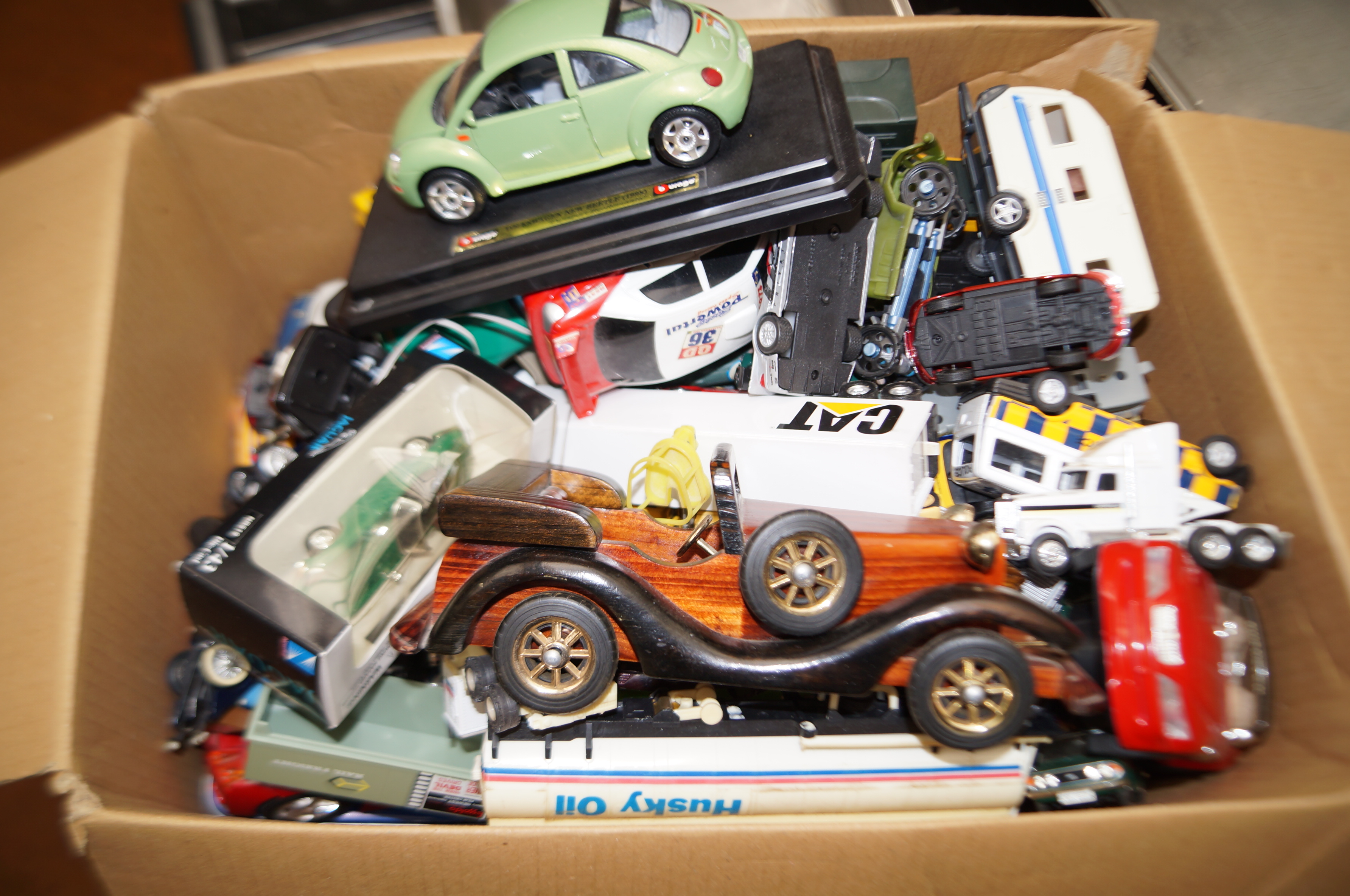 Large box of unsorted collectable cars