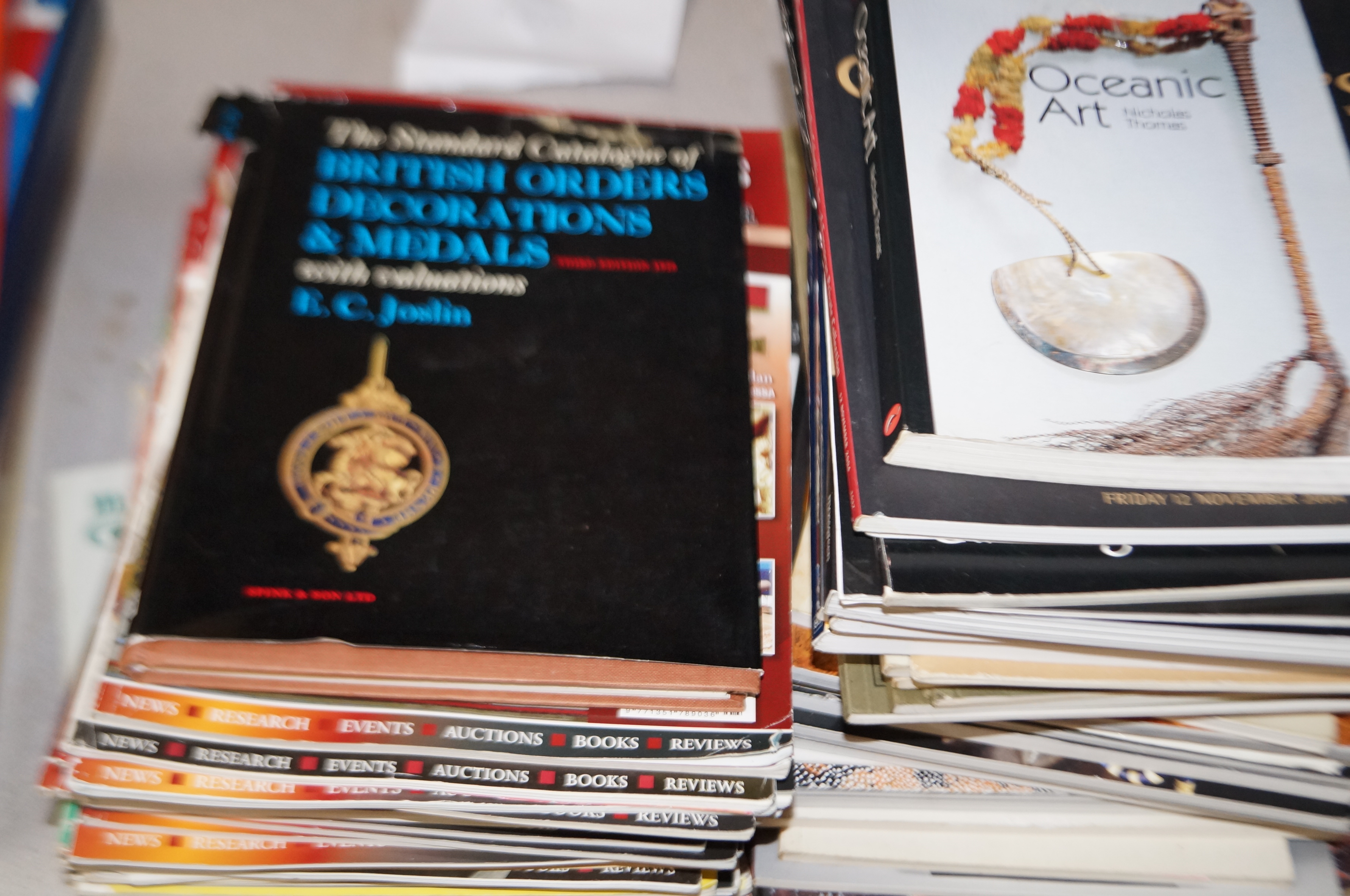 Military reference books together with further art