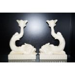 Pair of Wedgwood drabware dolphin candle sticks He