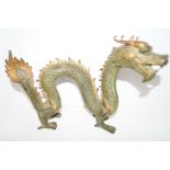 Patinated bronze figure of a dragon Length 26 cm