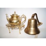 Brass wall mounted bell together with brass trivet