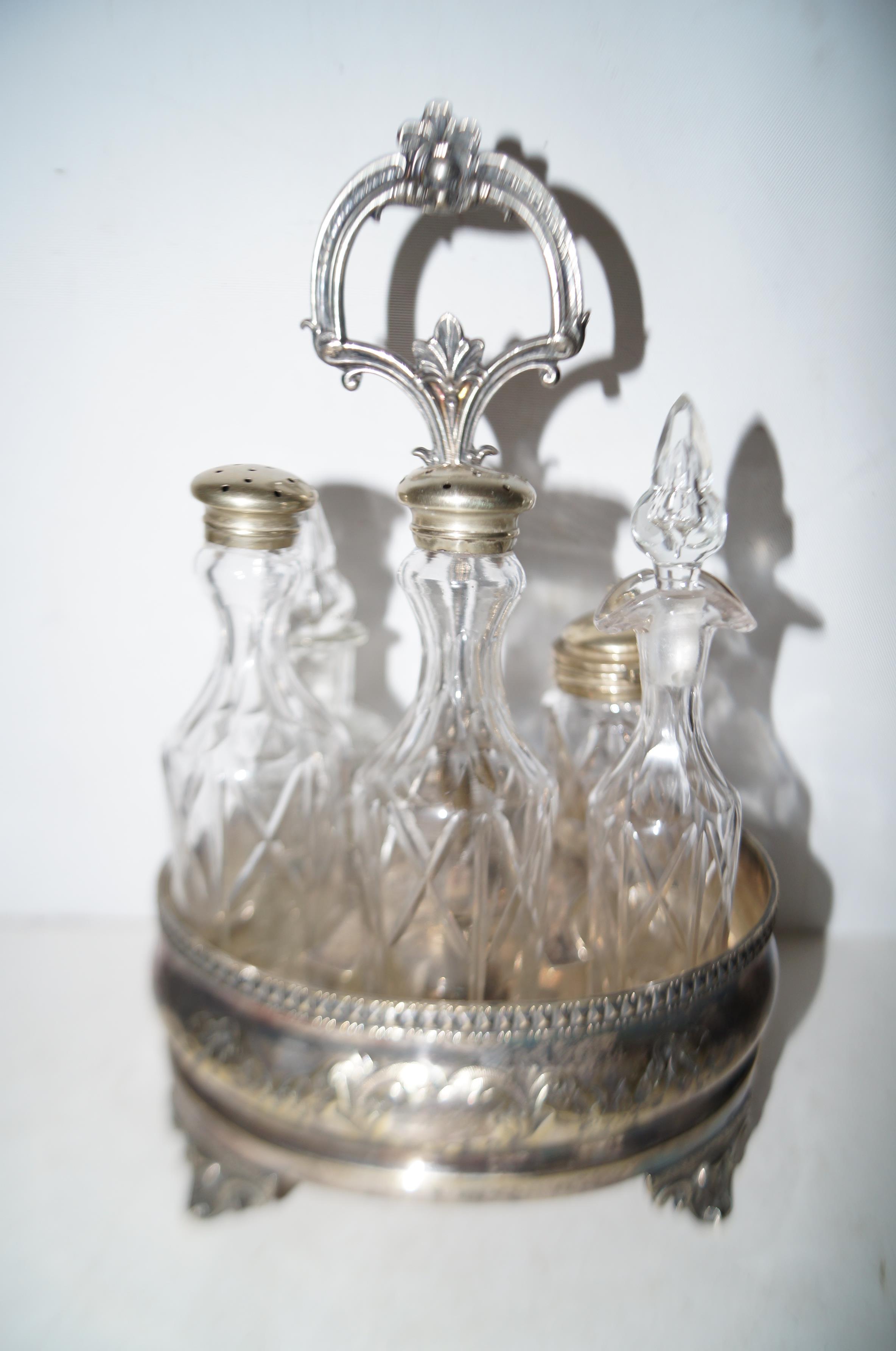 Silver plated part cruet set, together with plated