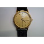 Gents Omega dress watch with leather strap require