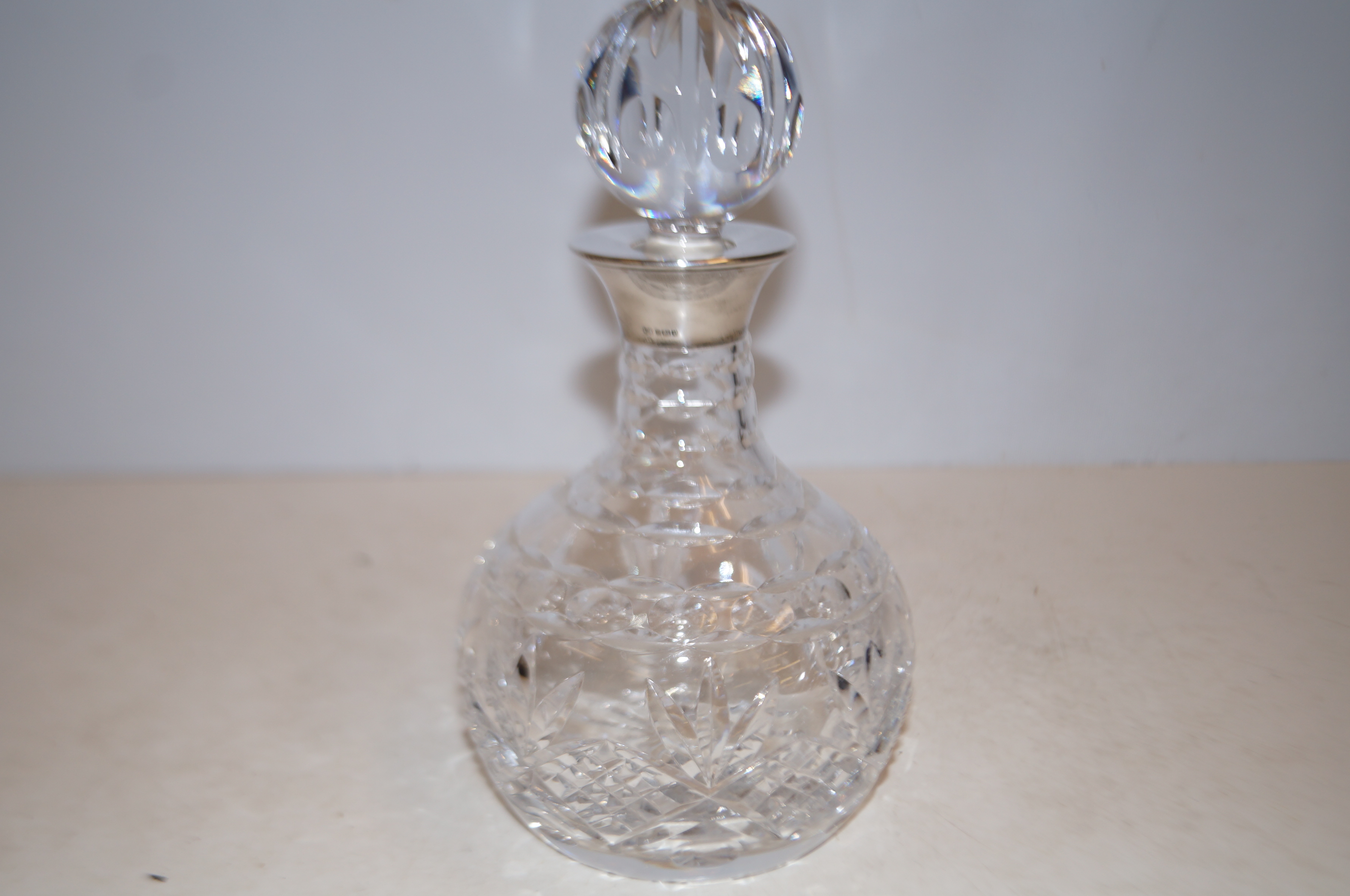 Silver cut class decanter with cut glass top Heigh