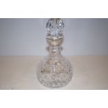 Silver cut class decanter with cut glass top Heigh