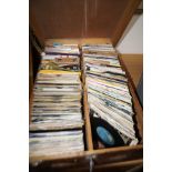 Wooden case full with single records