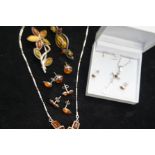 Collection of silver & amber jewellery to