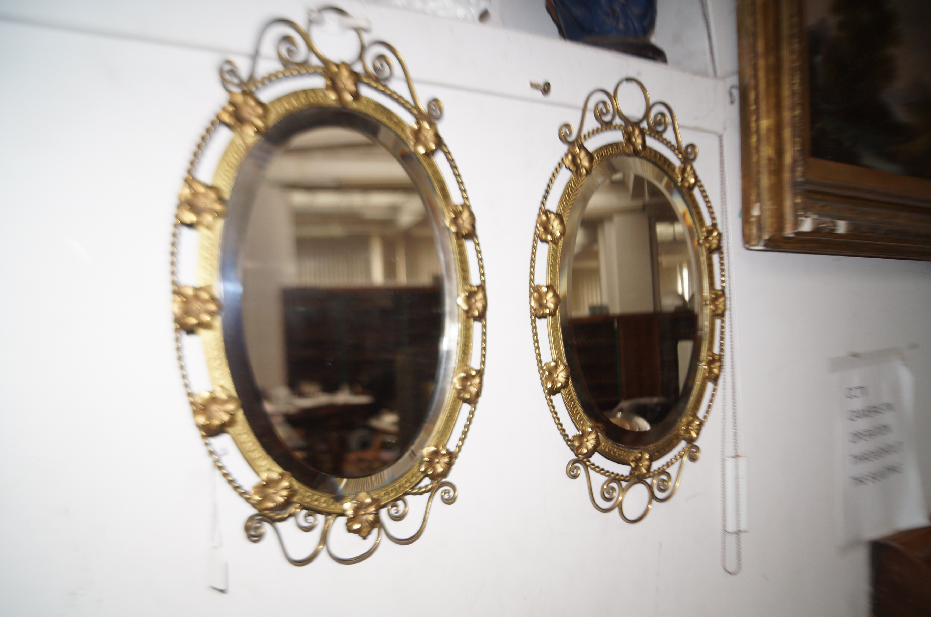 Pair of brass framed mirrors