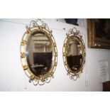 Pair of brass framed mirrors