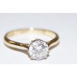 Solitaire round cut, diamond ring approx 1ct. Set in a 18ct gold band on a raised platinum mount. Di