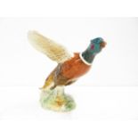 Beswick pheasant in flight Width 26 cm