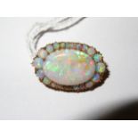 Good quality opal pin brooch set in tested for hig