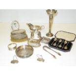 Collection of silver items to include, gravy boat,