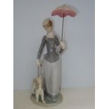 Large Lladro figure of a lady with a spaniel and u
