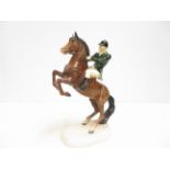 Beswick huntsman on a jumping horse (Green coat). Restoration to figure