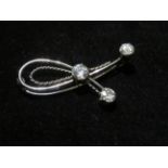 White metal pin brooch set with three good size, high quality round cut diamonds