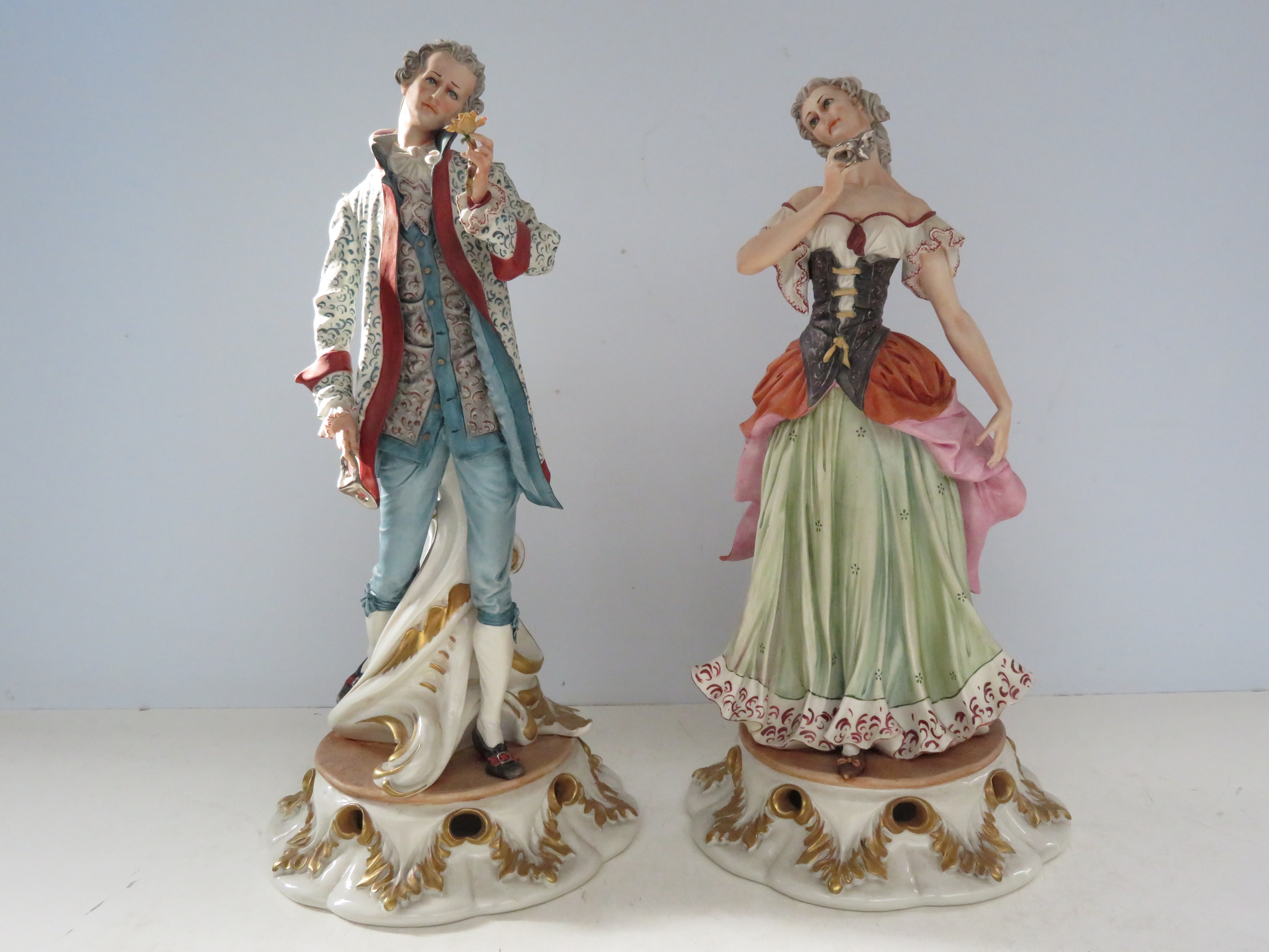 A large pair of Capodimonte masquerade figures. Th