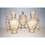 Early 20th century lidded jar with matching vases