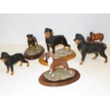 4x Resin figures of Rottweilers together with mode