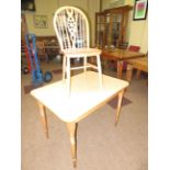 7 Dining tables & approx 30 wheel back matching ch