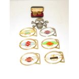 7 Belt buckles together with a pair of cufflinks
