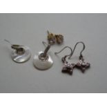 3 Pairs of silver earrings