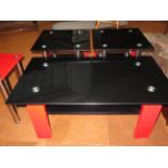 Contemporary black & red coffee table with 2 match