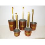 Set of copper & brass measuring ladles