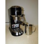De'Longhi EC685BK Traditional Pump Espresso Machine, working order together with a stainless steel m