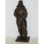 Bronze figure of a Russian pilot signed Height 22