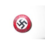 Enamel swastika badge
