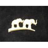 Bone elephant brooch