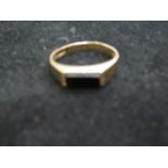 9ct Gold ring set with black stone