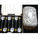 Cased set of silver coffee bean spoons together wi