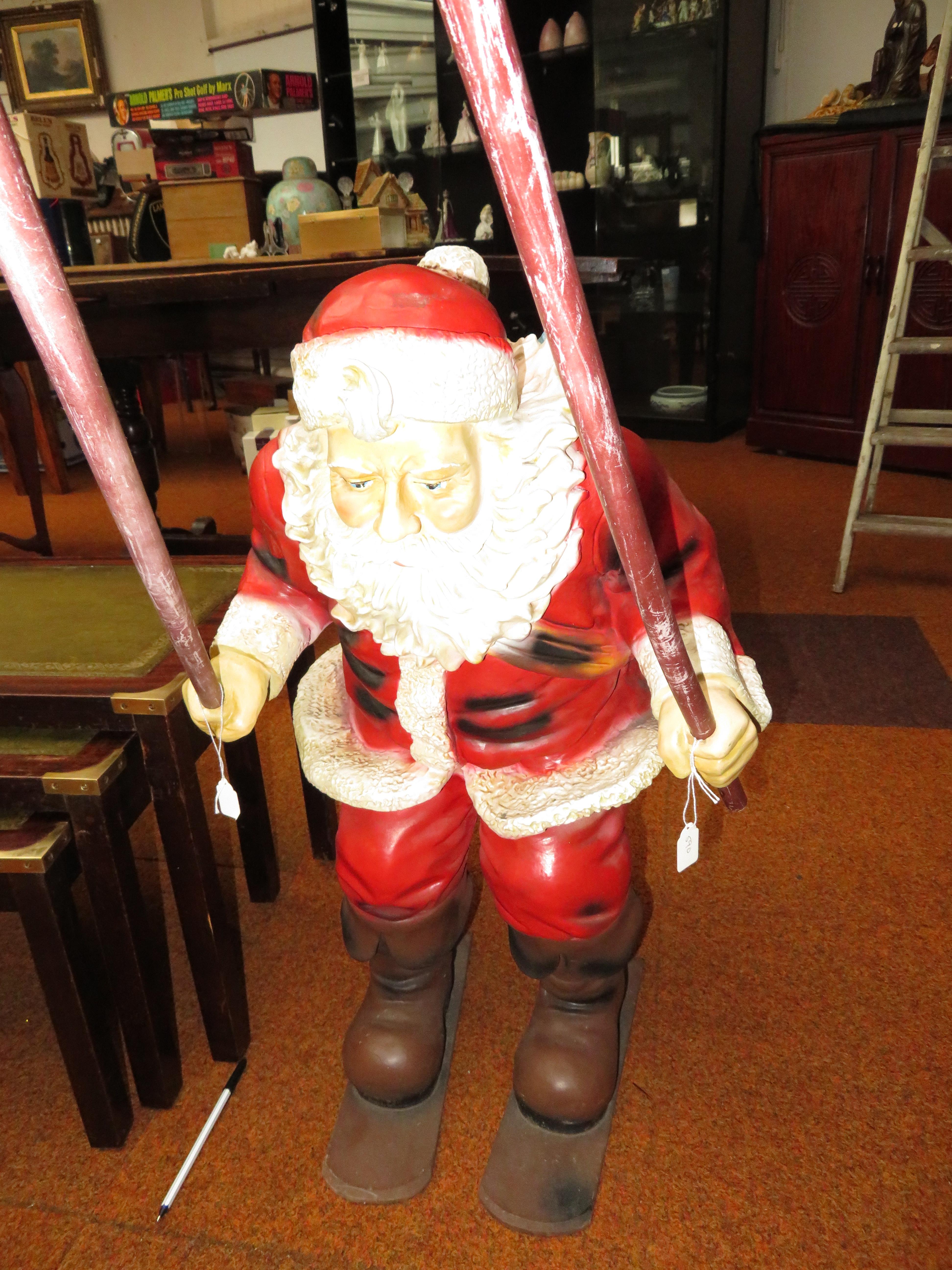 1960's department store display Santa Claus on ski