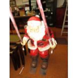 1960's department store display Santa Claus on ski