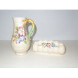 Clarice cliff vase together with Clarice cliff flo