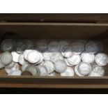 Wooden box of silver 3 pence pieces