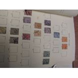 An album of British stamps, many mint